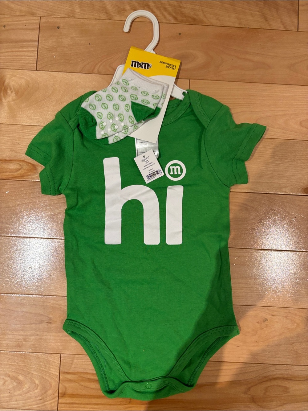 BNWT M&M'S Green Baby One-Piece with White "hi" Graphic and Sock Set